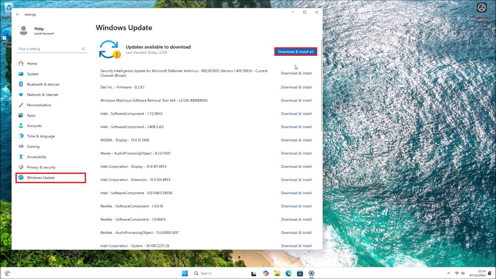 Windows 11 Settings Windows Update page listing available updates with a Download and install all button